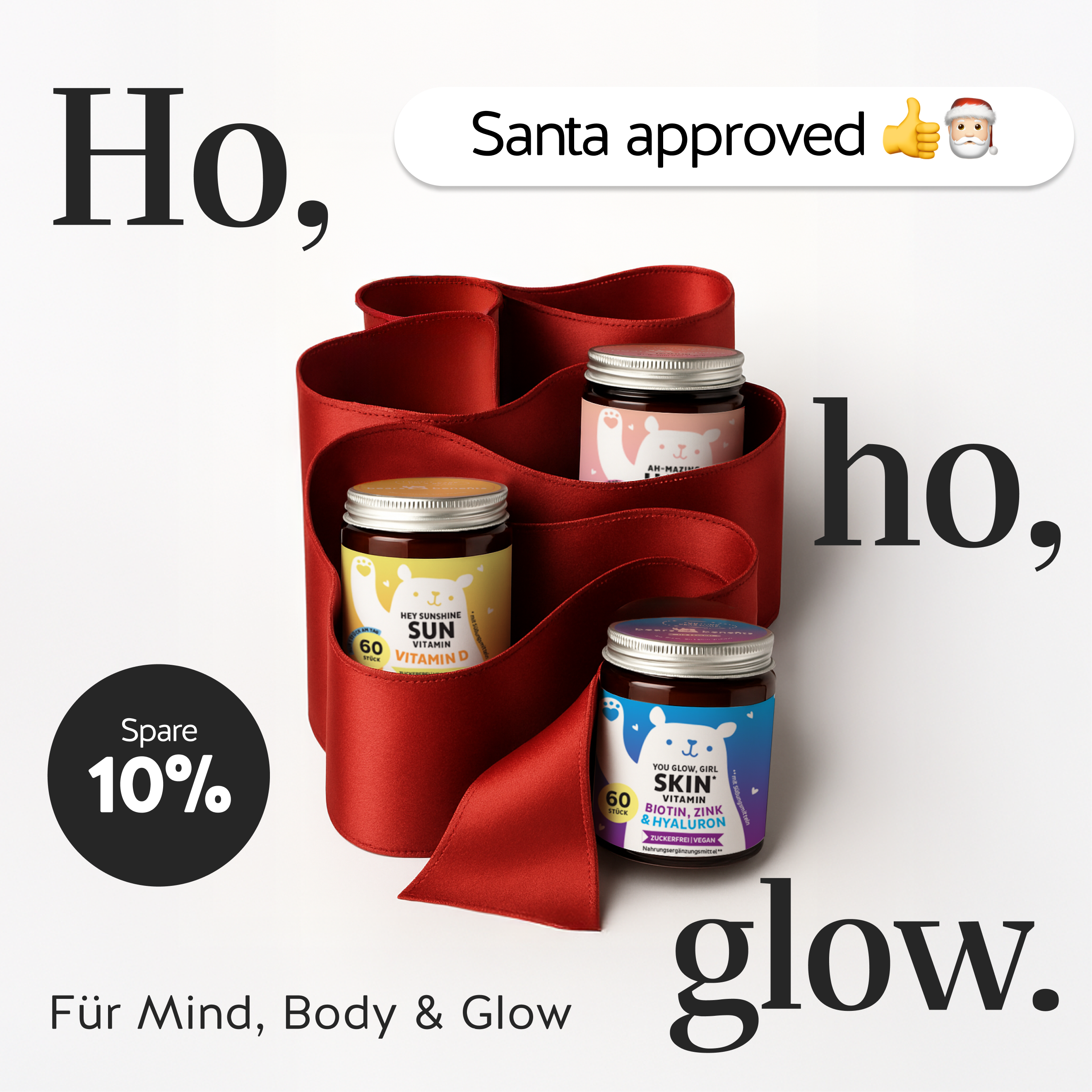 Bears Christmas promotion with three supplement jars wrapped in red ribbon and the phrase Ho, ho, glow.